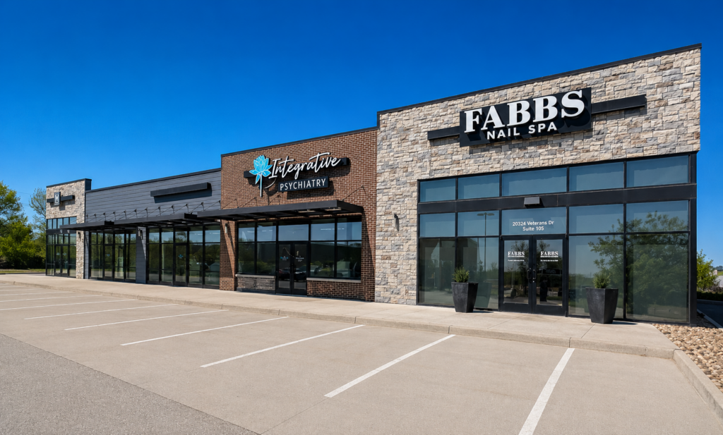 Ohana mixed-use retail property at 20324 Veterans Drive with tenant storefronts, modern architecture, and surface parking in Elkhorn, Nebraska